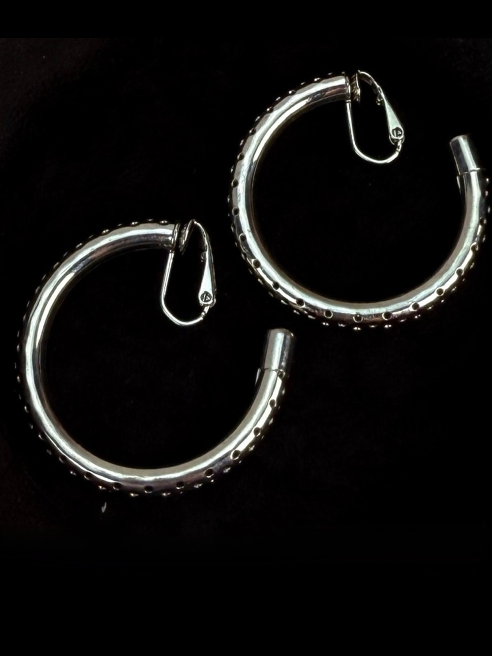 Silvertone open hoop clip on costume earrings